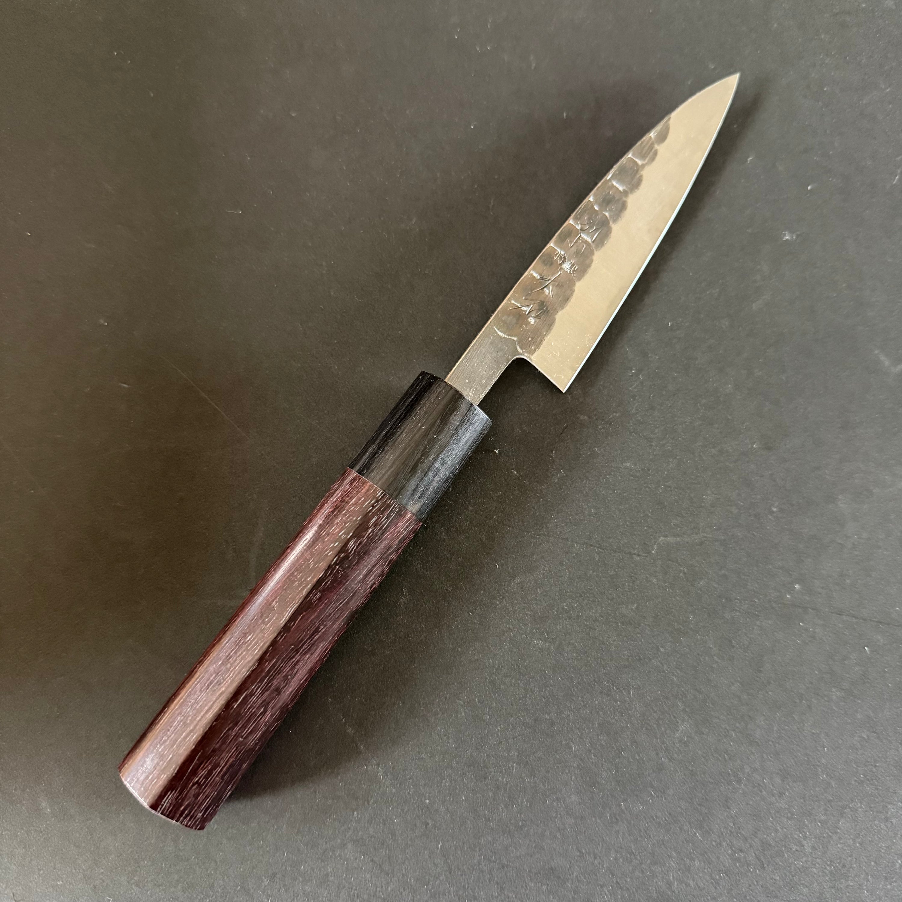Petty knife, Aogami 2 core with stainless steel cladding, Tsuchime Kurouchi Finish, 85mm - Ohishi
