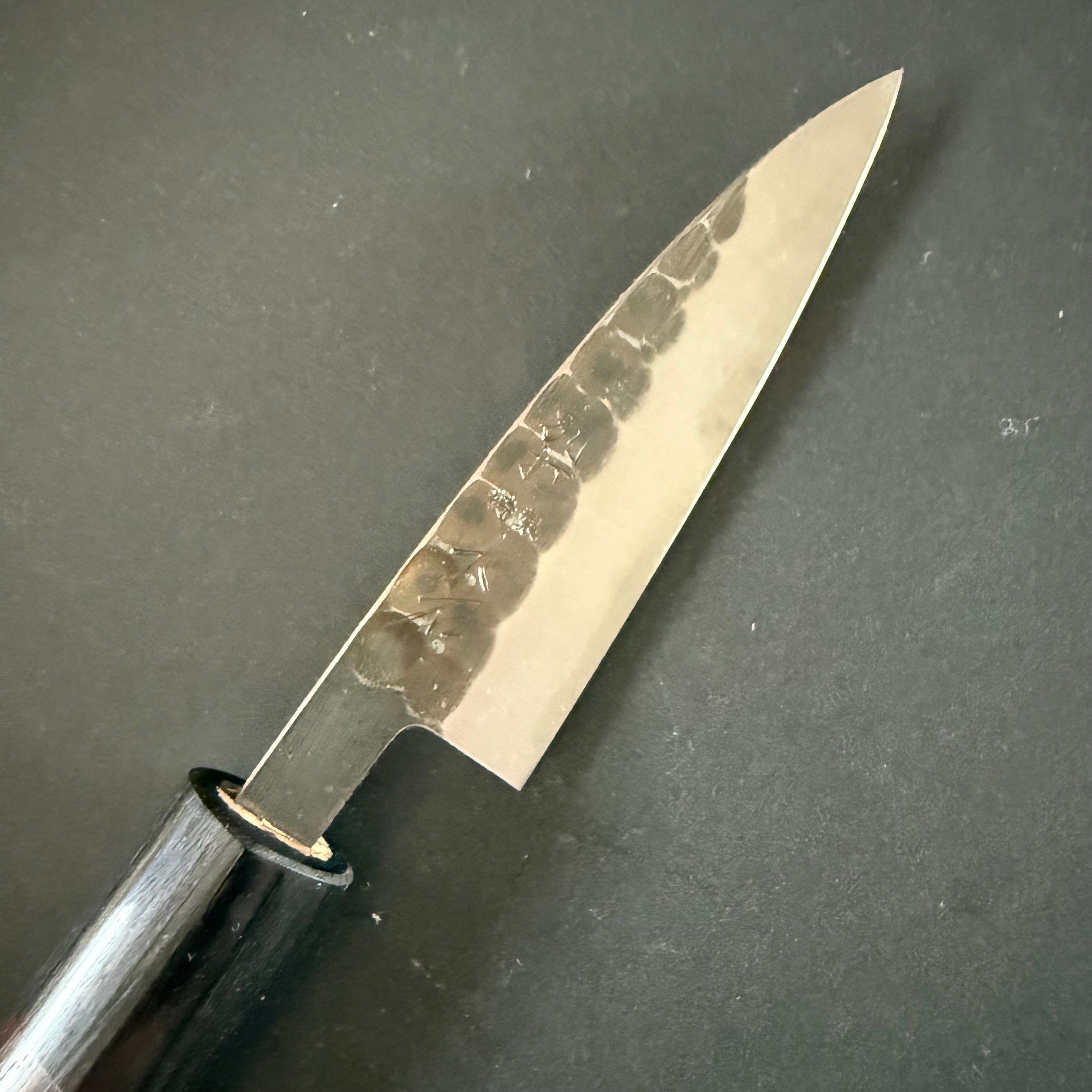 Petty knife, Aogami 2 core with stainless steel cladding, Tsuchime Kurouchi Finish, 85mm - Ohishi