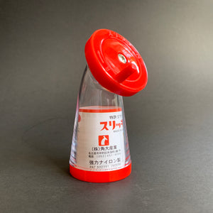 Sesame grinder with red top