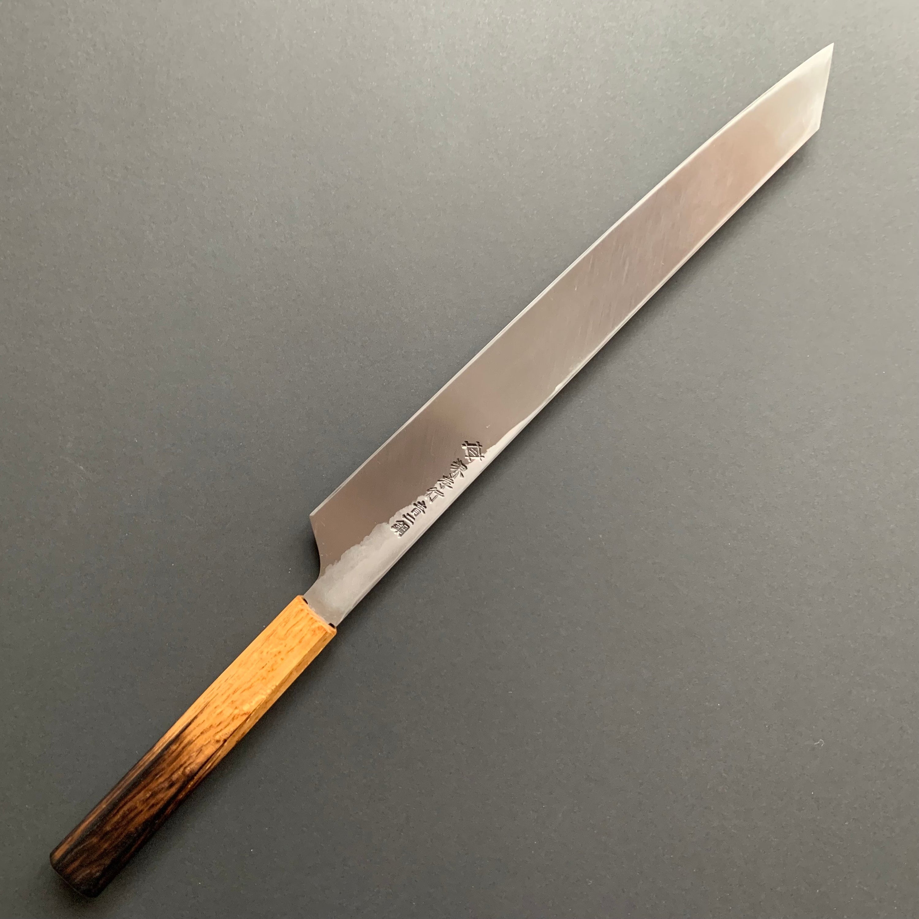 Kengata Yanagiba knife, Aogami 2 carbon steel with iron cladding, Kurouchi and Tsuchime finish, Homura series - Sakai Takayuki